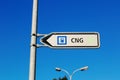 Sign shows direction gas station with CNG. Traffic sign indicating a CNG gas station. Royalty Free Stock Photo