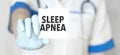 Sign sleep apnea and hand with stethoscope of Medical Doctor Royalty Free Stock Photo