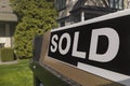 Sign sold in front of a house in residential area. Royalty Free Stock Photo