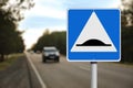 Sign Speed Bump near asphalt road outdoors Royalty Free Stock Photo