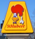 Sign of St-Hubert BBQ Ltd is a chain of Canadian casual dining restaurants Royalty Free Stock Photo