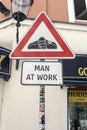 Sign at the Statue of Cumil, the man at work in Bratislava Royalty Free Stock Photo