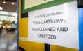 Sign at store stating Carts Have Been Cleaned And Sanitized