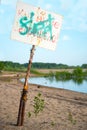 Sign swimming prohibited on the beach Royalty Free Stock Photo