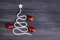 Sign symbol Christmas tree on a wooden background. A copy of space. The idea of a merry new year. Christmas. Royalty Free Stock Photo