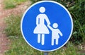 Sign or symbol for pedestrians. Warning road sign of blue sign baby take care when walk across the road symbol.