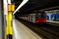 Sign symbol SOS.Subway metro train station platform with. Metropolitan railroad, railway Royalty Free Stock Photo