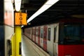 Sign symbol SOS.Subway metro train station platform with. Metropolitan railroad, railway Royalty Free Stock Photo