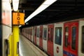 Sign symbol SOS.Subway metro train station platform with. Metropolitan railroad, railway Royalty Free Stock Photo