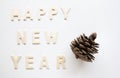 Sign and Symbol text of wooden Happy new Year on white backgrou