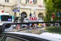 Sign of taxicab in Paris Royalty Free Stock Photo
