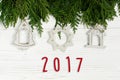 2017 sign text on christmas simple toys on green tree branches o Royalty Free Stock Photo