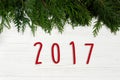 2017 sign text on christmas tree branches border on stylish whit Royalty Free Stock Photo
