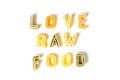 Sign, text love raw food made of italian pasta on white background, veggie diet and eating concept