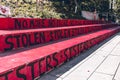 A sign with text `No more stolen sisters` on the Robson Square. Memorial to honour Missing and Murdered Indigenous Women in US and
