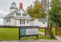 Sign at 45th parallel shows Mission Point Lighthouse, Traverse Bay, Lake Michigan, Traverse City.