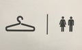 A SIGN TO HANG COATS AND FOR A RESTROOM or WC in black and white