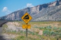 Sign of traffic alerts downhill slope. Royalty Free Stock Photo