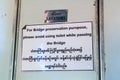 Sign in a train crossing Gokteik viaduct, Myanmar. It says: For Bridge preservation purpose, please avoid using toilet while Royalty Free Stock Photo