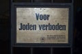 Sign used during world war 2 with dutch text Voor joden verboden which menans no jews allowd Royalty Free Stock Photo