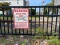 A sign warniing people of fines if they disobey the railroad crossing in Springfield, Illinois