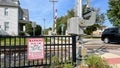 A sign warniing people of fines if they disobey the railroad crossing in Springfield, Illinois