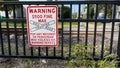 A sign warniing people of fines if they disobey the railroad crossing in Springfield, Illinois
