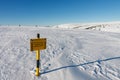 A sign warning of the avalanche area, white elbe valley, krkonose mountains, winter day