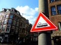 Tram crossing sign in Amsterdam, Holland Royalty Free Stock Photo