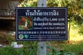 Sign warns visitors against feeding the monkeys in Phi Phi Don, Thailand