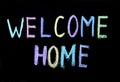 Sign welcome home on chalkboard