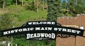 Sign welcome tourists to historic Main Street in Deadwood, SD