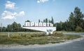 Sign welcoming visitors of dead city Pripyat text on sign: Pripyat 1970.