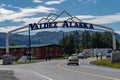 Sign welcoming visitors to Valdez, Alaska. Sign is an arch with