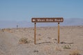 Sign for West Side Road, a remote backcountry desert, dirt road in Death Valley National Park in California Royalty Free Stock Photo