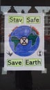 Sign in window stay safe save the world Sydenham south east london