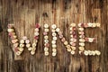 Sign wine made from corks on wooden vintage table Royalty Free Stock Photo