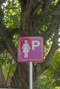 Sign for woman parking in car park. Lady parking sign