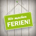 Sign Wooden Background Wir machen Ferien