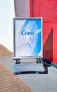 Sign with the word Crew in front of the entrance to an airport or cruise ship port Royalty Free Stock Photo