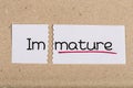 Sign with word immature turned into mature