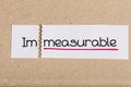 Sign with word immeasurable turned into measurable Royalty Free Stock Photo