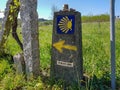 Sign with yellow scallop shell signing the way to Santiago de Compostela on the Saint James pilgrimage way, Camino Portuguese Royalty Free Stock Photo