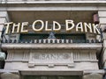 Signage above the entrance to The Old Bank bar and restaurant in James Street, Liverpool, UK.