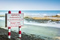 Signage danger beach Royalty Free Stock Photo
