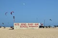 Sign for kitesurfing and surfing school on Corralejo beach Fuerteventura, Spain.