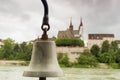Signal bell at the crossing of the river Rhine in front of the Cathedral in the Swiss city of Basel. Royalty Free Stock Photo