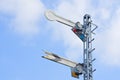 Signal caution pole of train with cloud and blue sky Royalty Free Stock Photo