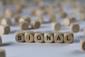 Signal - cube with letters, sign with wooden cubes