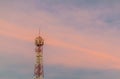 Signal tower with twilight sky on sunset time. Royalty Free Stock Photo